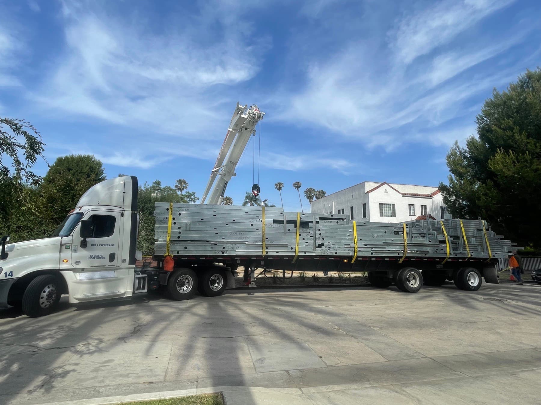 Panelized light-gauge steel wall panels delivered to an ADU Concepts build site